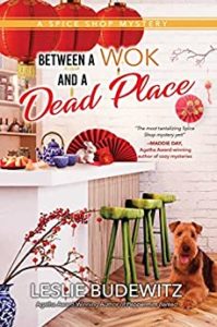 Between a Wok and a Dead Place by Leslie Budewitz