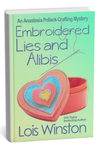 Embroidered Lies and Alibis by Lois Winston